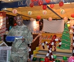 DLA Troop Support Commander Army Brig. Gen. Gavin Lawrence addresses employees from the Industrial Hardware supply chain in Philadelphia Dec. 20, 2019 during the judging of this year’s holiday decorating contest.