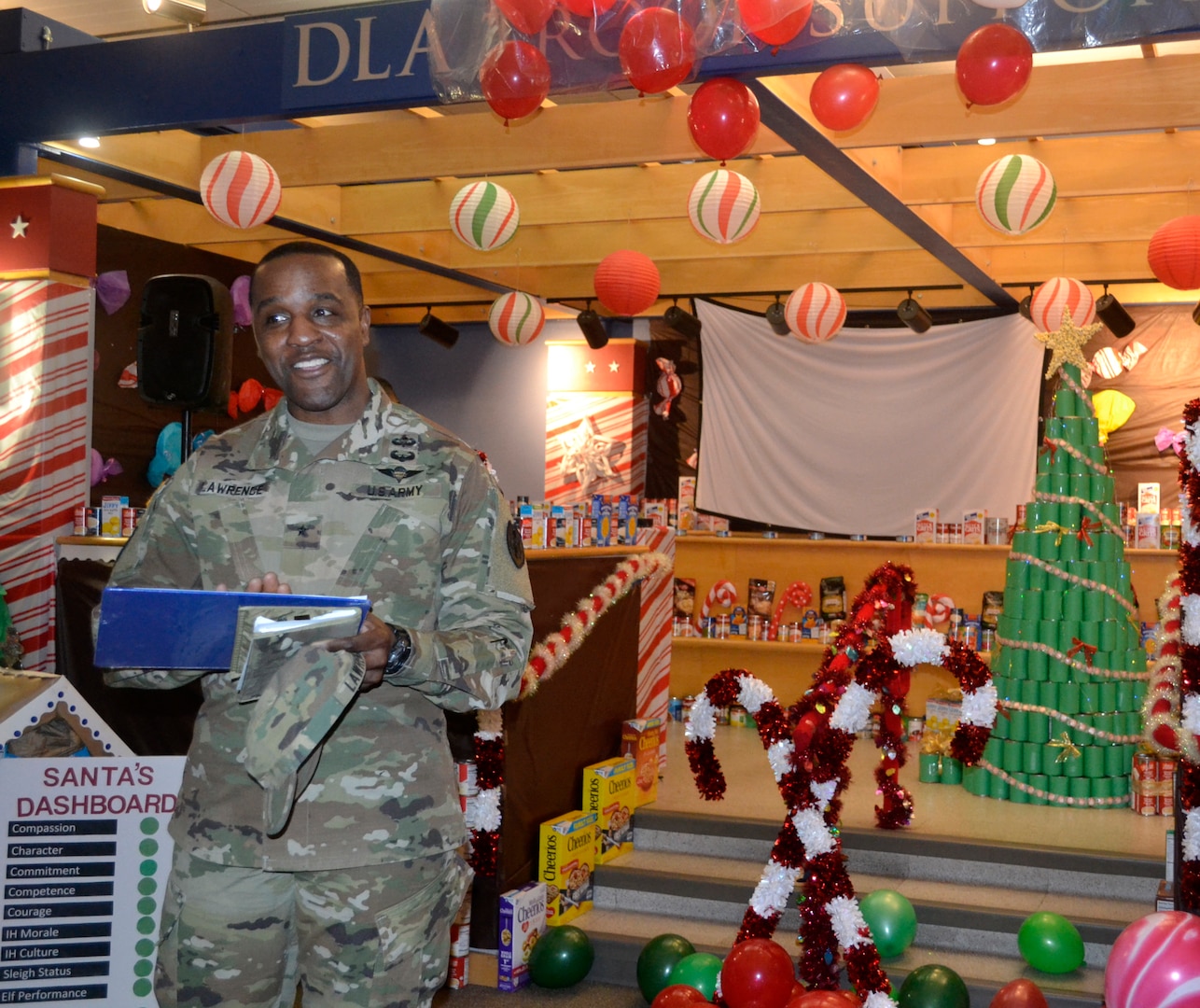 DLA Troop Support Commander Army Brig. Gen. Gavin Lawrence addresses employees from the Industrial Hardware supply chain in Philadelphia Dec. 20, 2019 during the judging of this year’s holiday decorating contest.