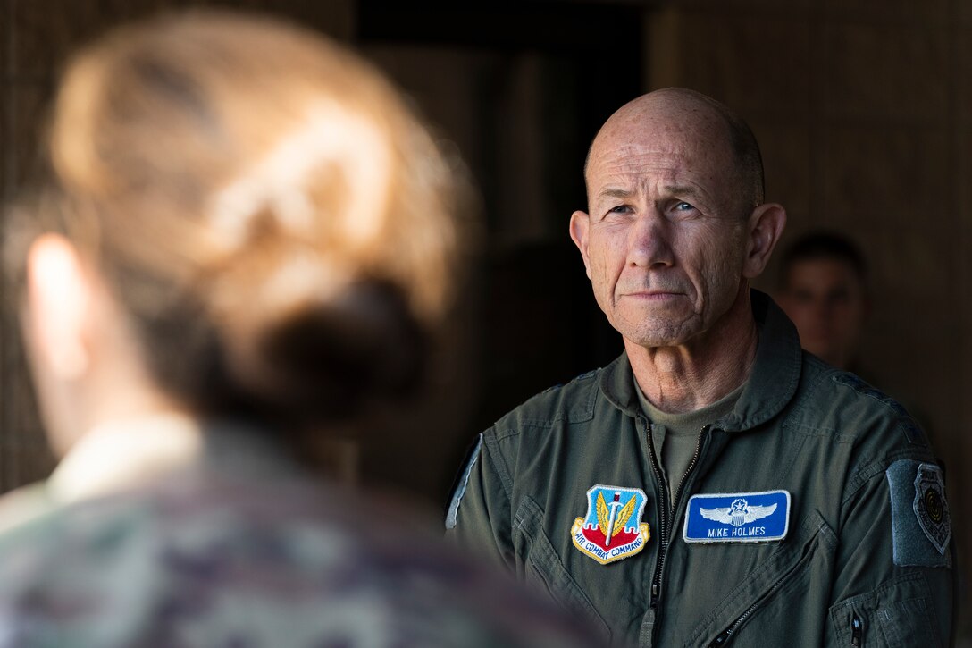 A photo of two Airmen talking