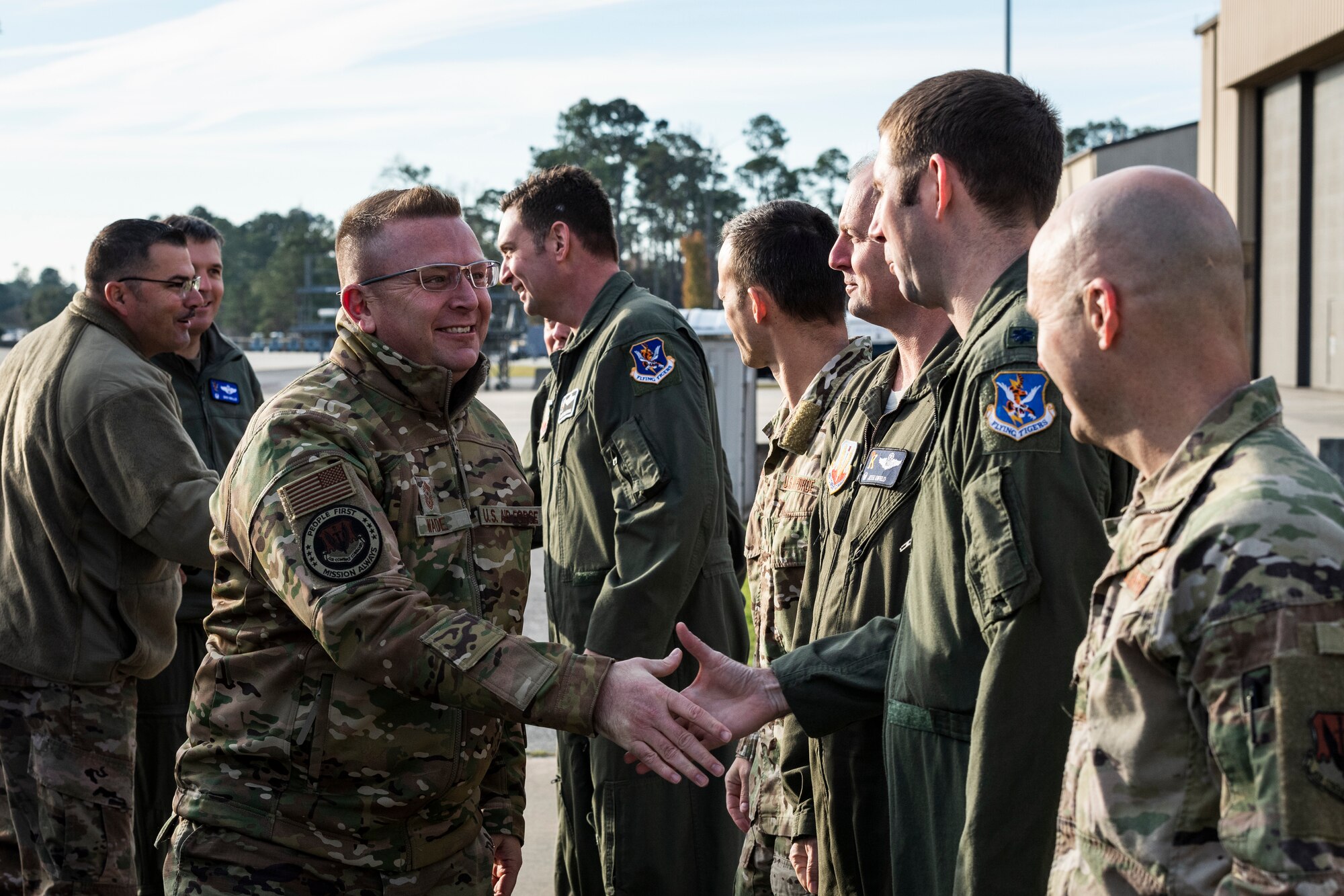 A photo of Airmen shaking hands