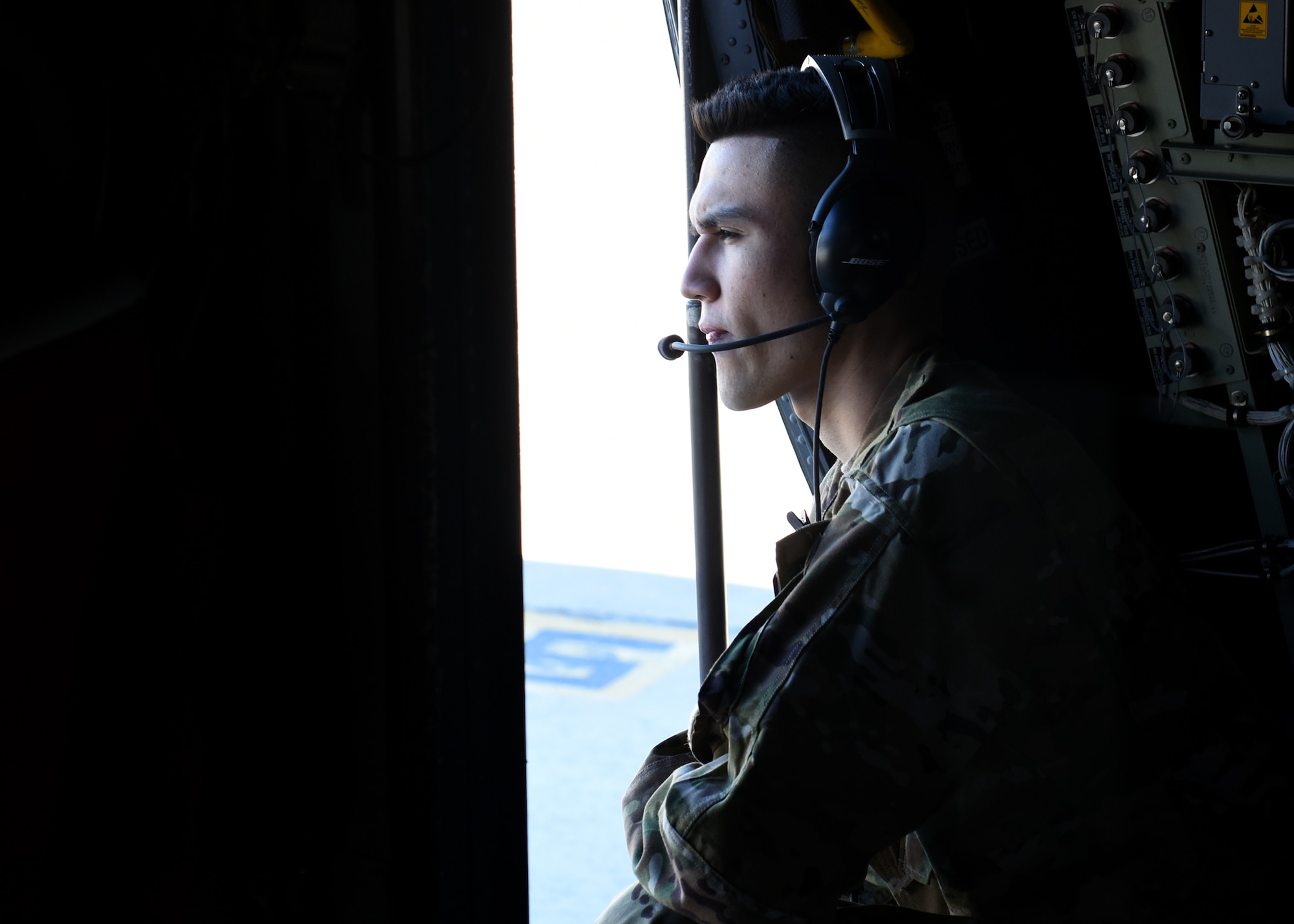 Photo of an Airman relaxing before a flight operation