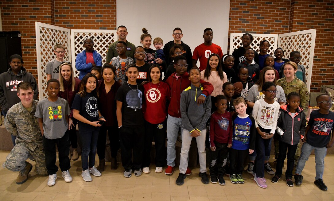 97th Operations Group (OG) members from Altus AFB, Altus. Okla. and residents of the Tipton Children Children’s Home in Tipton, Okla.