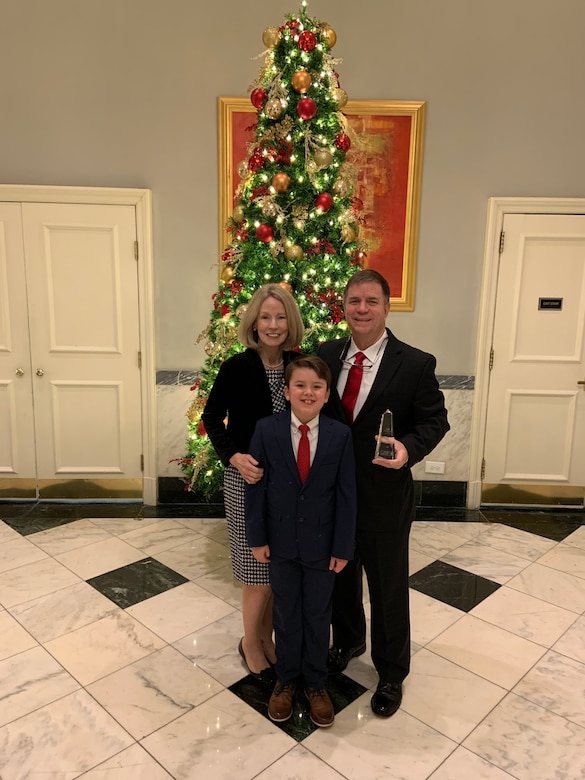 Alvin “Al” Lee, the Transatlantic Division’s Director of Programs and Business with his wife Dee and son Malachi following an awards ceremony where Lee was among 30 recipients named a "Distinguished Executive" during the annual Presidential Rank Award ceremony held Dec.17, 2019.