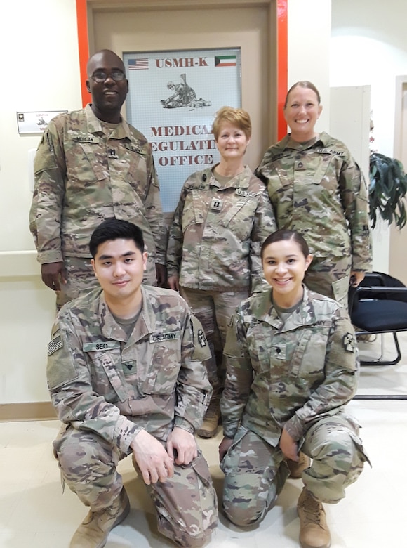 The MRO/PAD team picture from left to right. Back row, Capt. Morgan, Capt. Baumann and Sgt. 1st Class Brown, front row:  Spc. Seo and Spc. Jimenez. After nine-months of research, collaboration and old-fashioned hard work, CENTCOM now has standard procedures for everything related to patient administration from eligibility and registration to tracking, documentation and movement in theater as well as follow-on definitive care in the U.S.