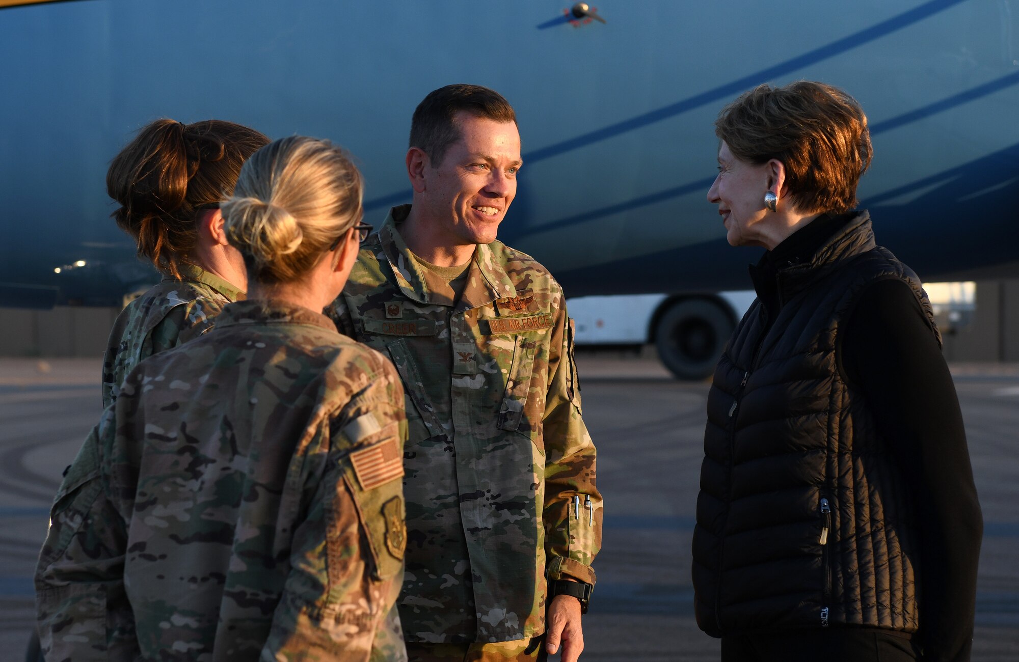 Secretary of the Air Force Barbara M. Barrett speaks to Col. Jonathan Creer, 409th Air Expeditionary Group commander, after her arrival to Nigerien Air Base 201, Niger, Dec. 21, 2019. While at the installation, Barrett learned how each unit supports the mission from building the future of the base to defending its assets and personnel. (U.S. Air Force photo by Staff Sgt. Alex Fox Echols III)