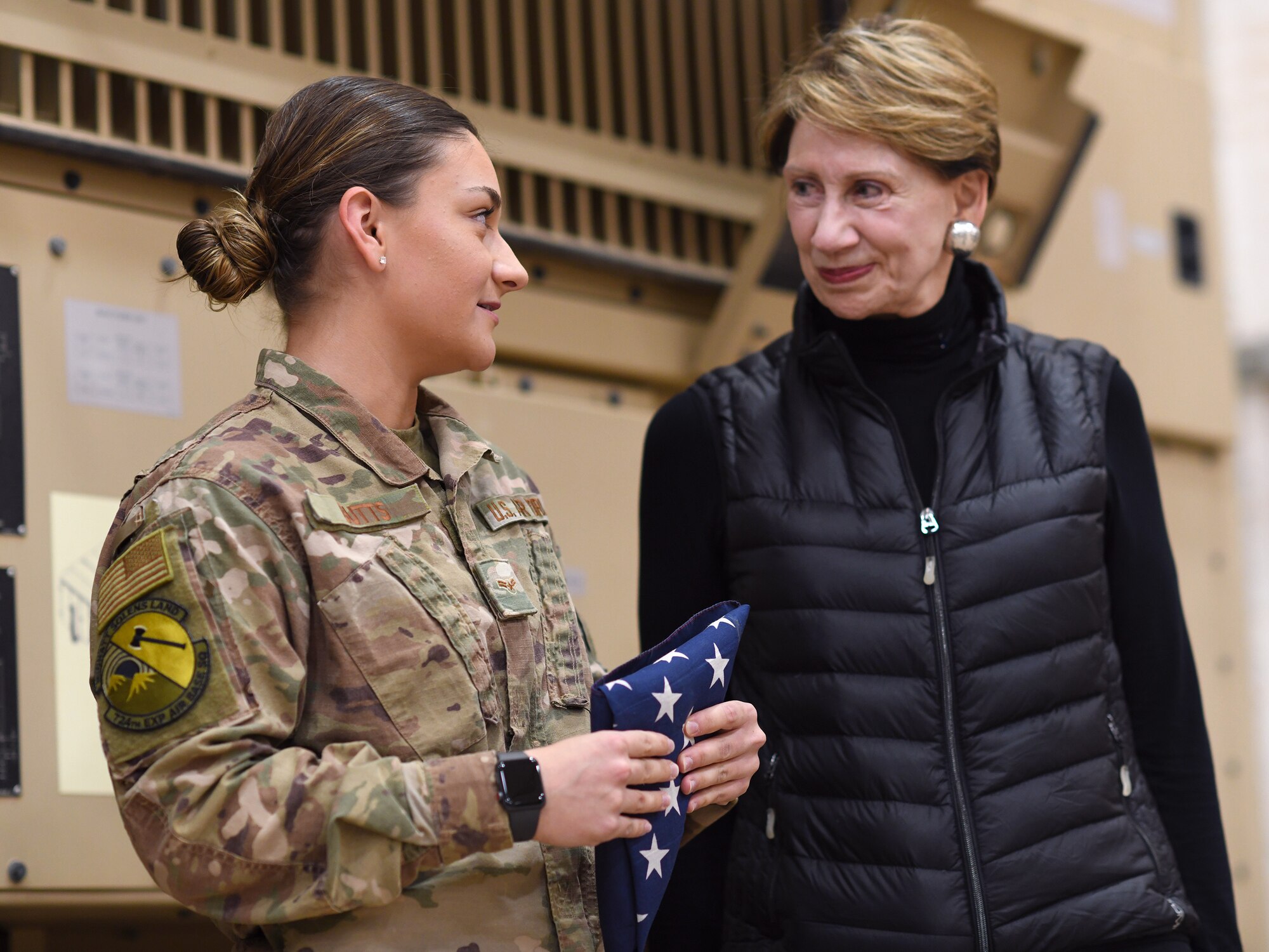 Secretary of the Air Force Barbara M. Barrett speaks to an Airman deployed to the 724th Expeditionary Air Base Squadron during her visit to Nigerien Air Base 201, Niger, Dec. 21, 2019. During her first visit to the African continent since taking office in October, Barrett’s focus was centered solely on the U.S. service members deployed there. (U.S. Air Force photo by Staff Sgt. Alex Fox Echols III)