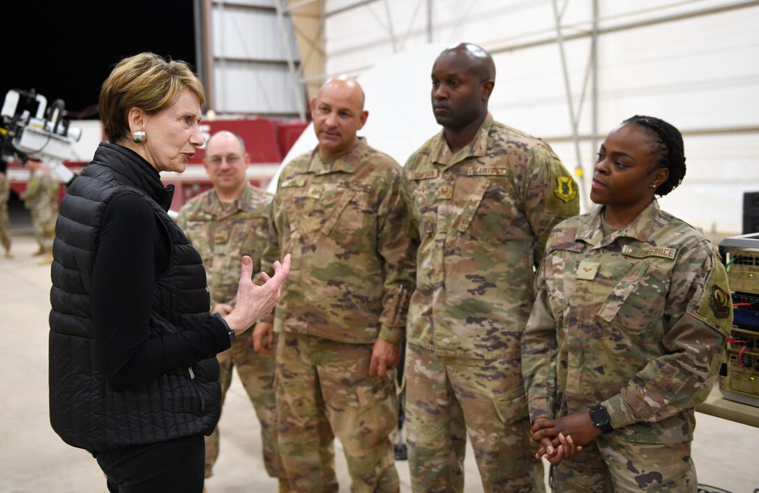 Secretary of the Air Force Barbara M. Barrett speaks to members of the 724th Expeditionary Air Base Squadron Communications Flight during her visit to Nigerien Air Base 201, Niger, Dec. 21, 2019. While at the installation, Barrett learned how each unit supports the mission from building the future of the base to defending its assets and personnel. (U.S. Air Force photo by Staff Sgt. Alex Fox Echols III)