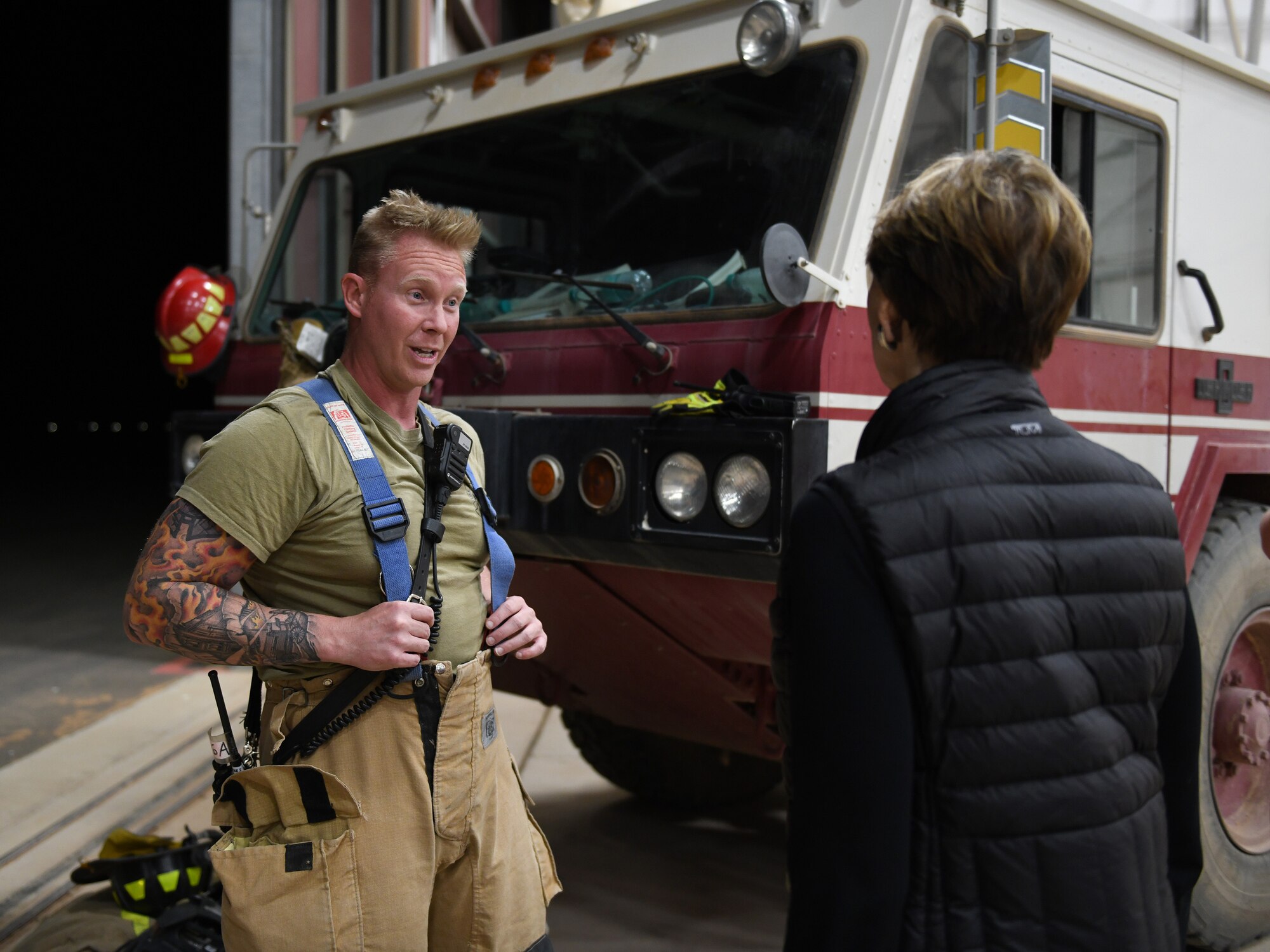 Secretary of the Air Force Barbara M. Barrett speaks to a firefighter deployed to the 724th Expeditionary Air Base Squadron during her visit to Nigerien Air Base 201, Niger, Dec. 21, 2019. During her first visit to the African continent since taking office in October, Barrett’s focus was centered solely on the U.S. service members deployed there. (U.S. Air Force photo by Staff Sgt. Alex Fox Echols III)