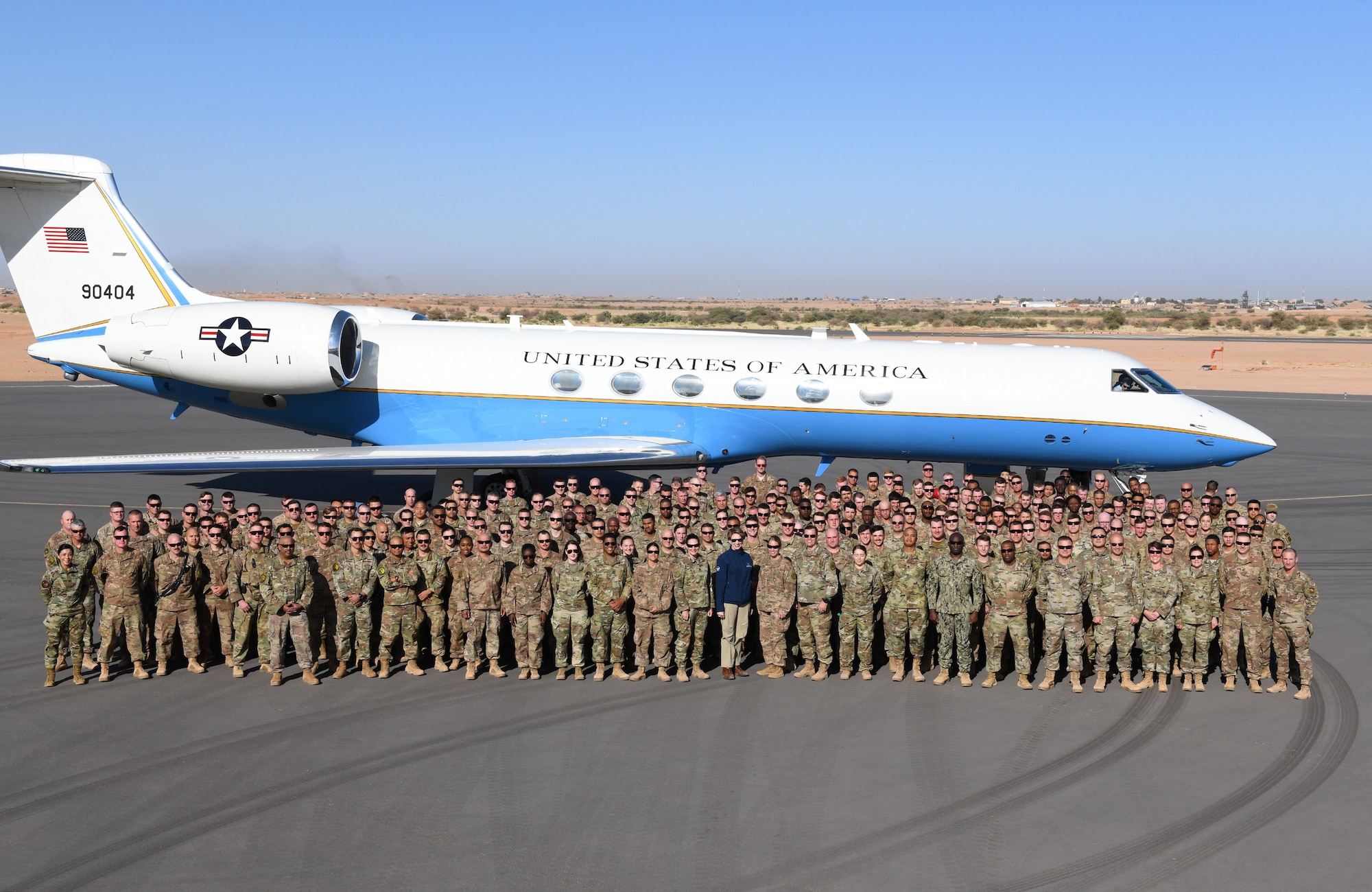 Secretary of the Air Force Barbara M. Barrett and service members deployed to Nigerien Air Base 201 pose for a photo in Agadez, Niger, Dec. 21, 2019. While at the installation, Barrett learned how each unit supports the mission from building the future of the base to defending its assets and personnel. (U.S. Air Force photo by Staff Sgt. Alex Fox Echols III)