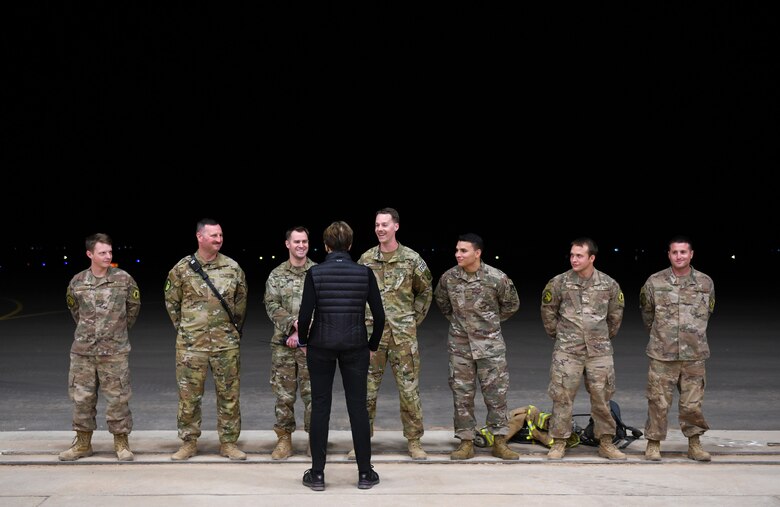 Secretary of the Air Force Barbara M. Barrett speaks to firefighters deployed to the 724th Expeditionary Air Base Squadron during her visit to Nigerien Air Base 201, Niger, Dec. 21, 2019. While at the installation, Barrett learned how each unit supports the mission from building the future of the base to defending its assets and personnel. (U.S. Air Force photo by Staff Sgt. Alex Fox Echols III)