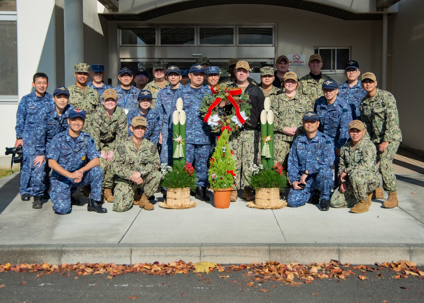 Chief petty officers from the U.S. Navy and the Japan
Maritime Self Defense Force (JMSDF) exchange a Christmas wreath and kodomatsu, or pine gate, at Naval Air Facility Atsugi. Kodomatsu are traditional Japanese decorations placed in front of homes and offices in pairs around the New Year to welcome kami (spirits) that will bring bountiful harvests and ancestral blessings in the New Year.