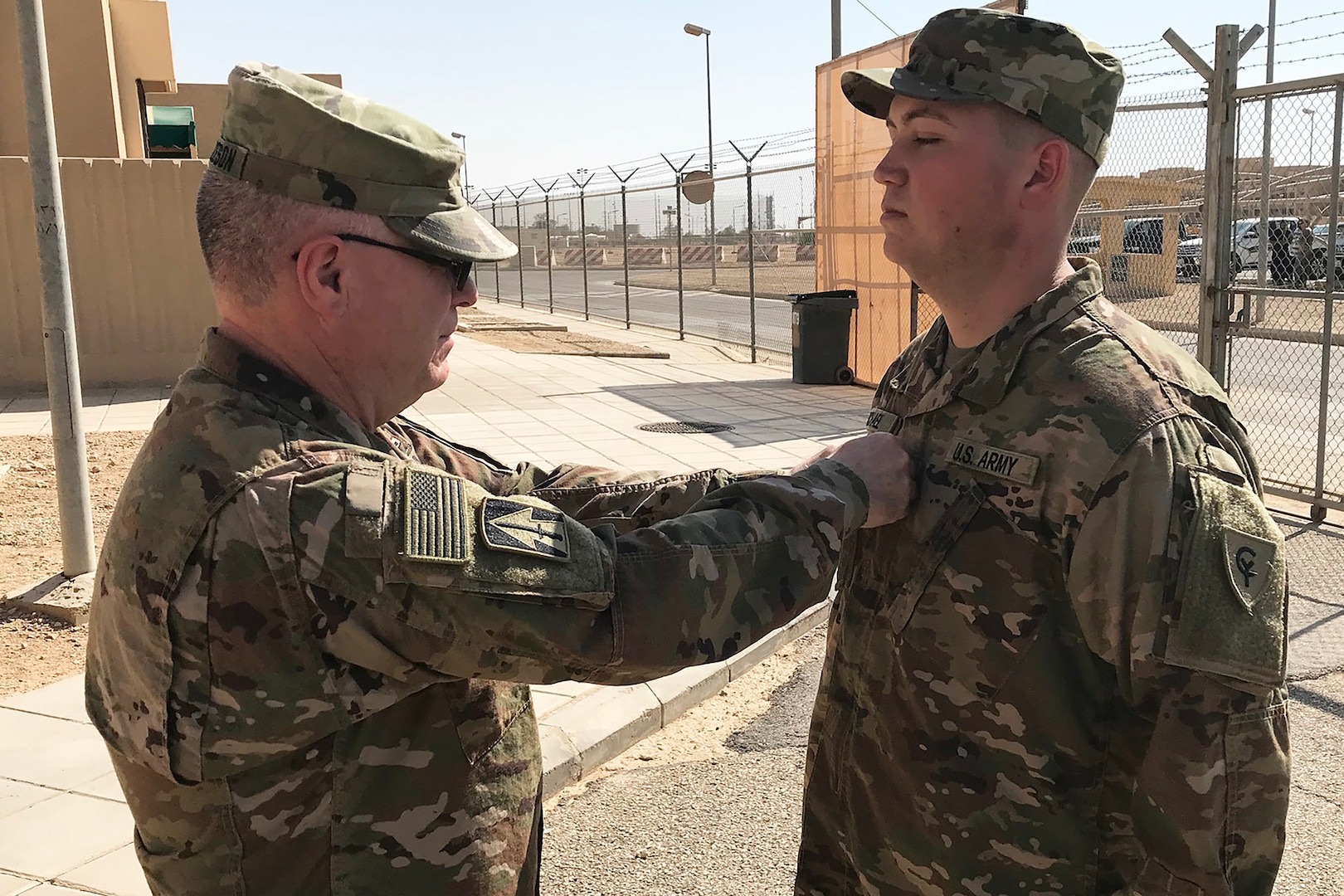 Indiana National Guard 1st Lt. Matthew Michael of Fort Wayne, a signal officer with the 38th Infantry Division, receives his new rank during his promotion ceremony in Saudi Arabia, Monday, Oct. 21, 2019. Michael is one of about 600 division soldiers who deployed to the Middle East in May to support Task Force Spartan, which helps strengthen defense relationships and build partner capacity within the region.