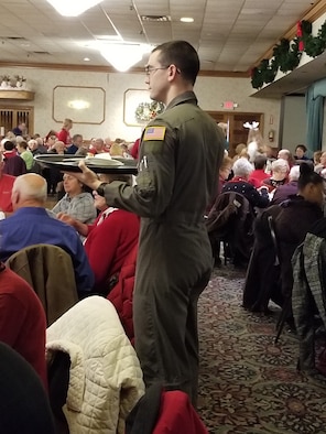U.S. Air Force 1st Lt. Mackenzie Ransford, from the 337th Airlift Squadron, helps clear tables during the annual Western Massachusetts Elder Care’s Feed the Elderly Holiday Meal.  The Dec. 18, 2019 event, held at the Chicopee Castle of Knights, attracted 630 senior citizens from the local area.  (U.S. Air Force photo by Lt. Col. Rodney Furr)