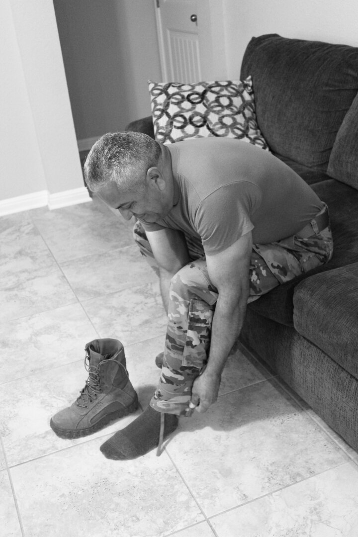Monica Echevarria, a student at Cole High School located at Joint Base San Antonio-Fort Sam Houston, took this image of a service member putting on their boots. The photo, titled “Daily Military Life,” is one of 101 images submitted by students in the Cole photography program that are included in an exhibit at the Fort Sam Houston Museum that opened Dec. 10.