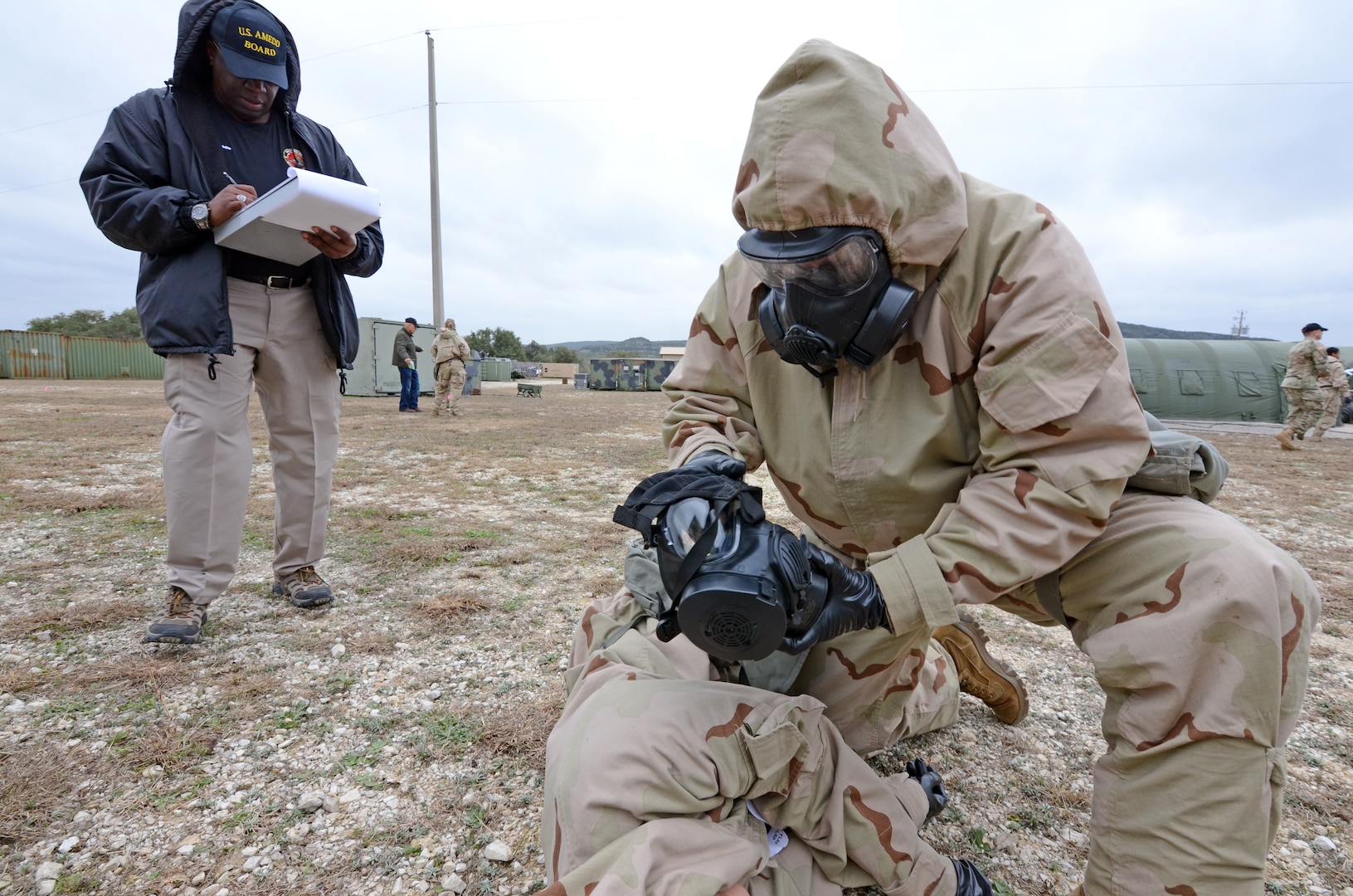 U.S. Army Medical Department Board test evaluator Eddie Fields writes down his observations during a similar auto-injector test performed earlier in 2019 at Joint Base San Antonio-Camp Bullis.