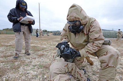 U.S. Army Medical Department Board test evaluator Eddie Fields writes down his observations during a similar auto-injector test performed earlier in 2019 at Joint Base San Antonio-Camp Bullis.