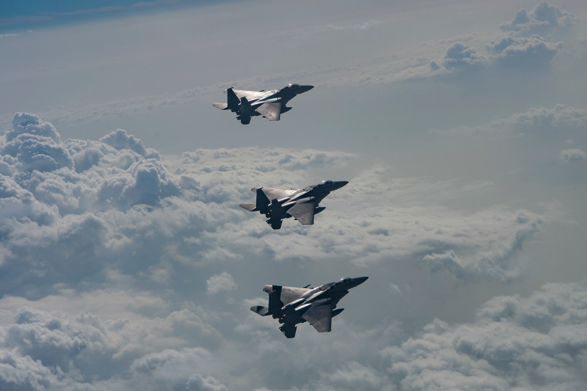 U.S. Air Force F-15E Strike Eagles assigned to the 494th Expeditionary Fighter Squadron, preform a 3-ship formation enroute to participate in a fly over honoring Qatar National Day, Dec. 18, 2019.