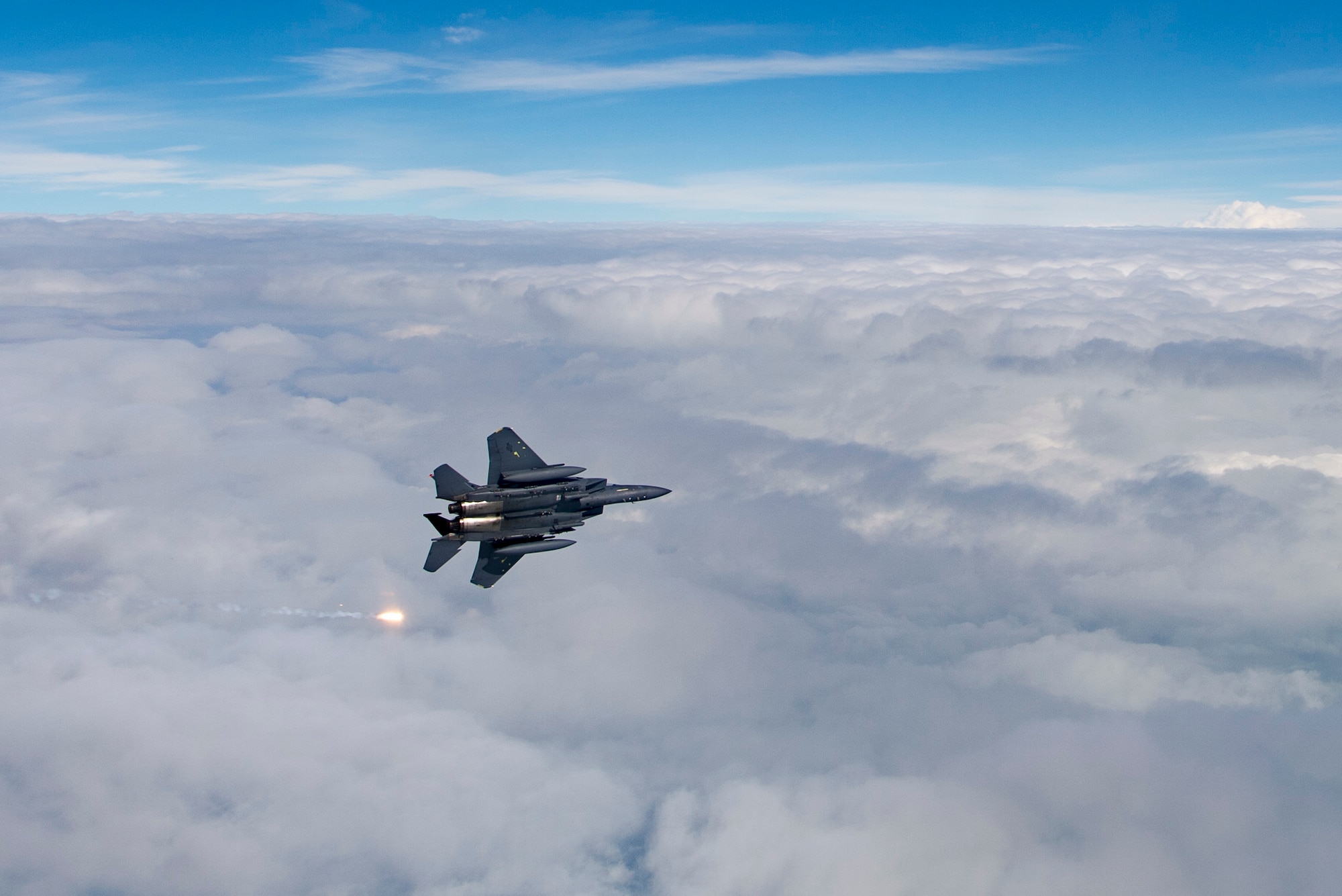A U.S. Air Force F-15E Strike Eagle assigned to the 494th Expeditionary Fighter Squadron, flies enroute to participate in a fly over honoring Qatar National Day, Dec. 18, 2019.
