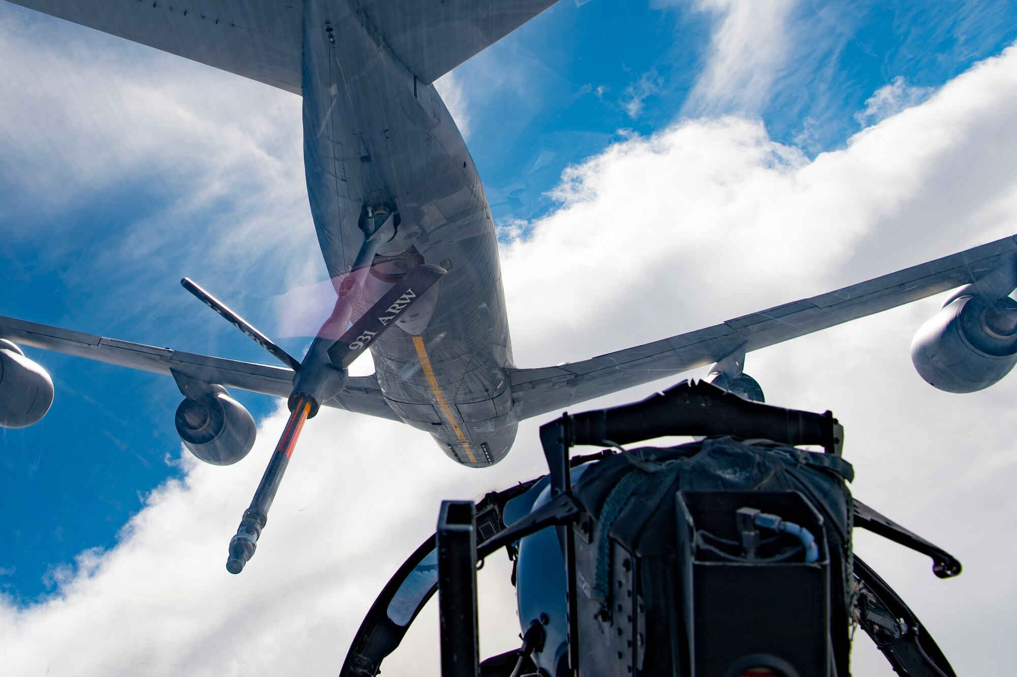 A U.S. Air Force F-15E Strike Eagle assigned to the 494th Expeditionary Fighter Squadron, refuels from a KC-135 Stratotanker assigned to the 28th Expeditionary Air Refueling Squadron enroute to participate in a formation fly over honoring Qatar National Day, Dec. 18, 2019.