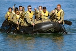 U.S. Army ROTC cadets from the University of San Francisco paddle a Zodiac boat as part of U.S. Army Cadet Command's Ranger Challenge, Oct. 26, 2019, at Marine Corps Base Camp Pendleton, California.