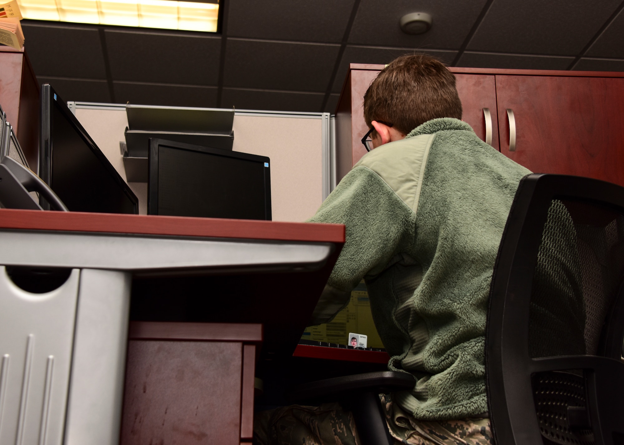 Airman works on computer