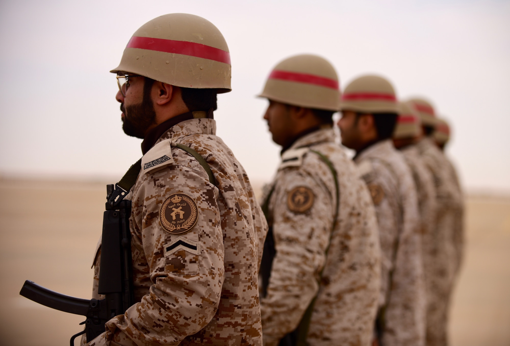 A member of the Royal Saudi Air Force honor guard awaits the arrival of U.S. Army Chief of Staff, Gen. James McConville, at Prince Sultan Air Base, Kingdom of Saudi Arabia, Dec. 18, 2019.
