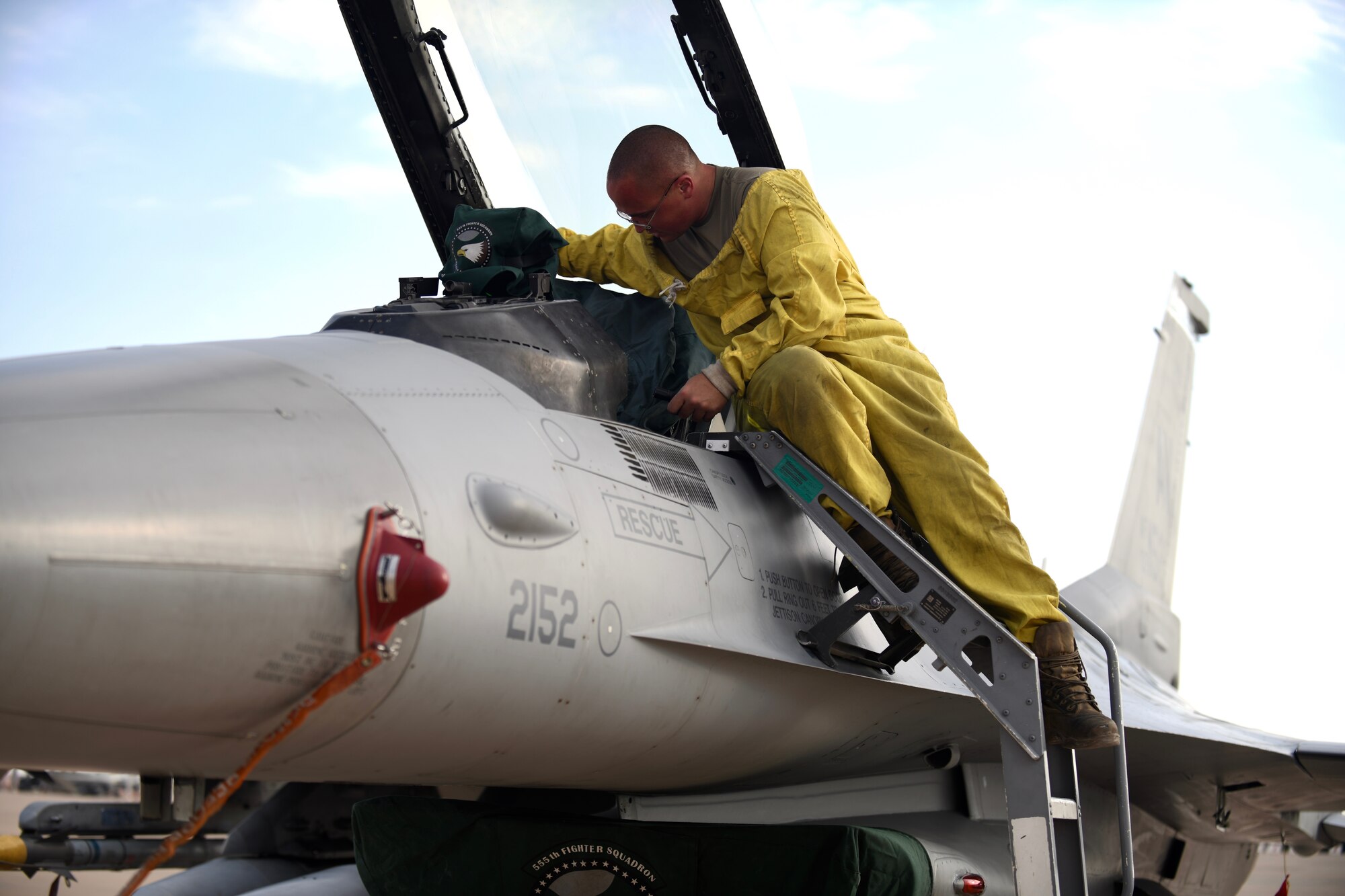 U.S. Air Force Senior Airman Donavan Finn, 555th Expeditionary Aircraft Maintenance Unit crew chief, , inspects an F-16 Fighting Falcon, assigned to the 555th Expeditionary Fighter Squadron, Dec. 2, 2019 following its forward deployment to Prince Sultan Air Base, Saudi Arabia.