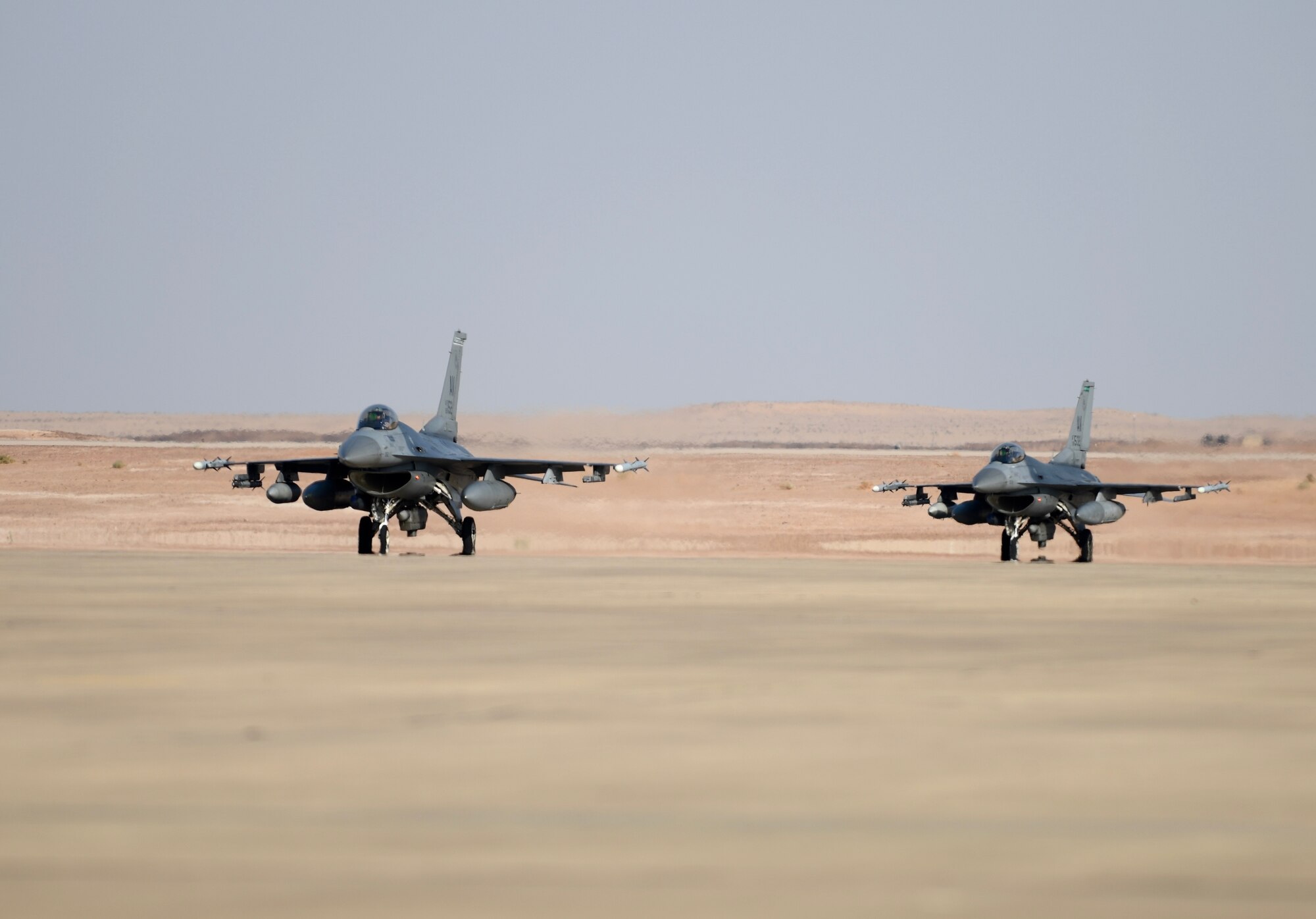 Two F-16 Fighting Falcons, assigned to the 555th Expeditionary Fighter Squadron, taxis after landing Dec. 2, 2019 at Prince Sultan Air Base, Saudi Arabia.