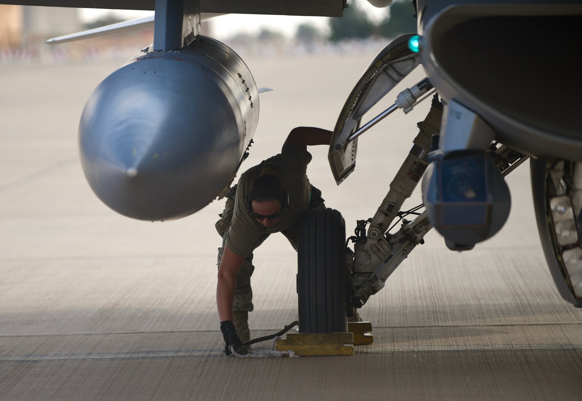 U.S. Air Force Senior Airman Eleanor Lapi, 555th Expeditionary Aircraft Maintenance Unit crew chief, inspects an F-16 Fighting Falcon, assigned to the 555th Expeditionary Fighter Squadron, Dec. 2, 2019 at Prince Sultan Air Base, Saudi Arabia.