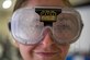 A U.S. Air Force 1st Fighter Wing Airman wears goggles that simulate the effects of being under the influence of alcohol during the Ready Airmen Program 2.0 event at Joint Base Langley-Eustis, Dec. 13, 2019. A standard drink is defined as 12 ounces of beer, 5 ounces of wine, or 1.5 ounces of distilled spirits, which contain the same amount of alcohol. (U.S. Air Force photo by Anthony Nin Leclerec)