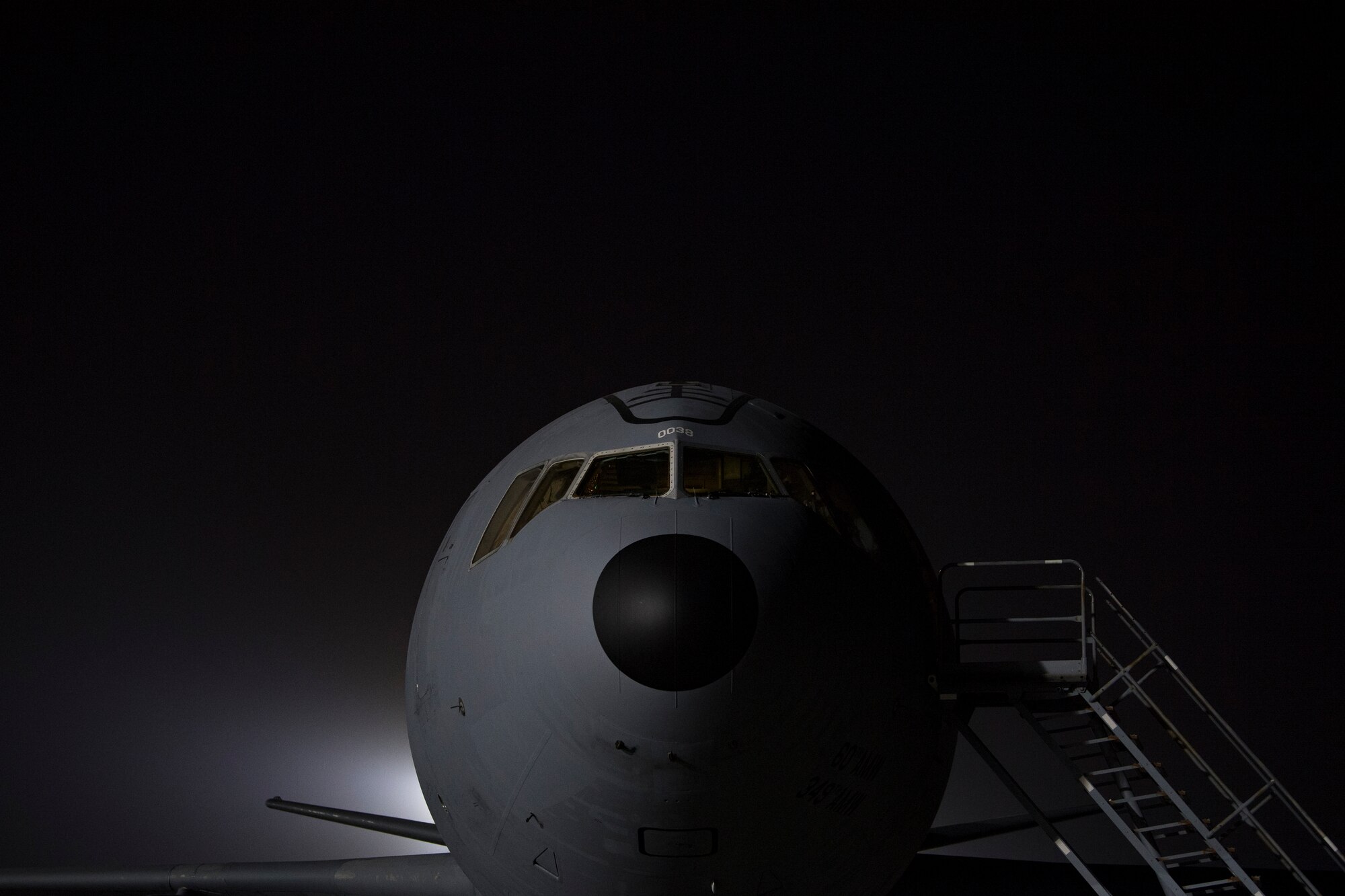 U.S. Air Force Airmen assigned to the 380th Expeditionary Wing conduct preflight inspections on a 908th Expeditionary Air Refueling Squadron (EARS) KC-10 Extender, at Al Dahfra Air Base, United Arab Emirates Dec. 17, 2019.