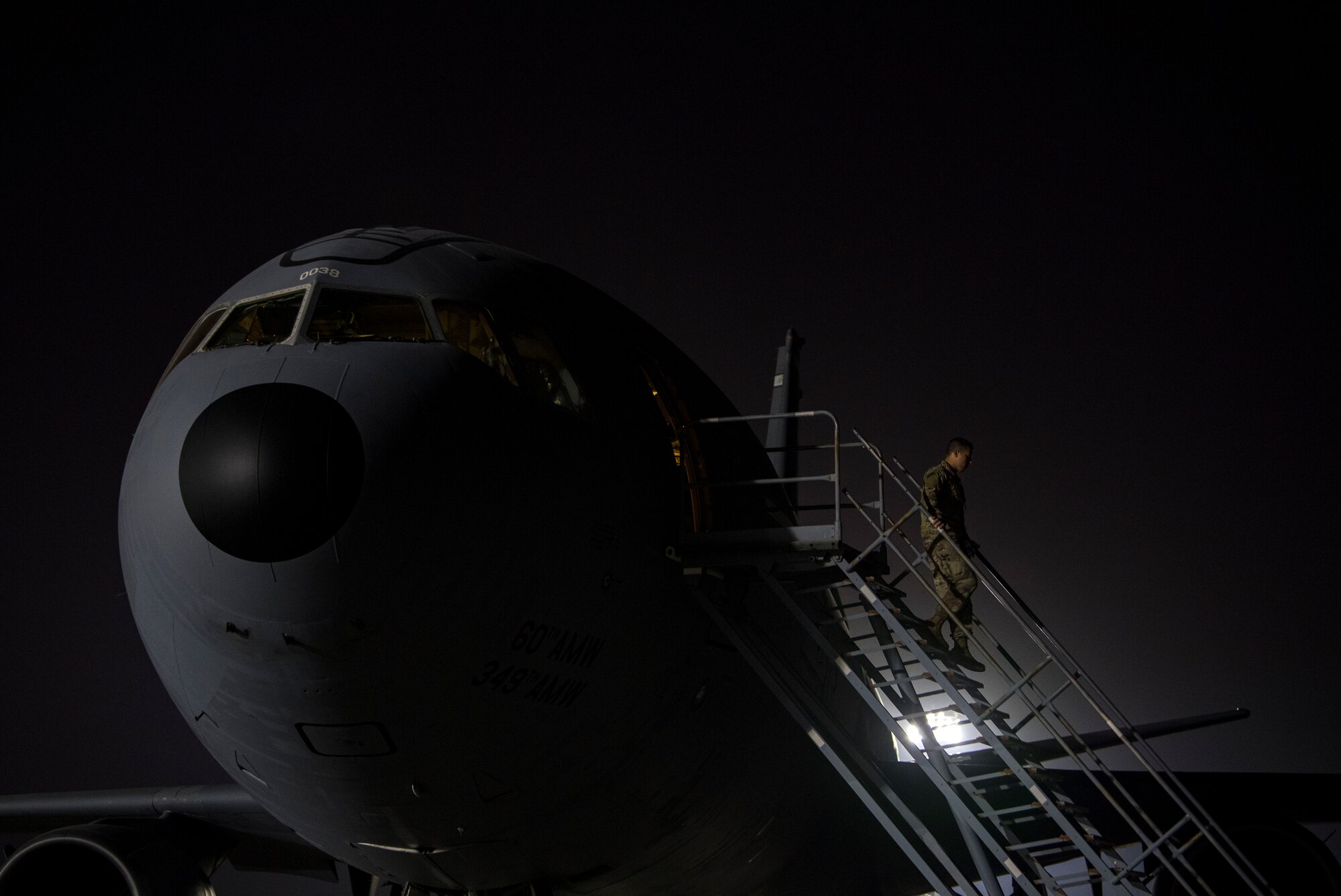 U.S. Air Force Airmen assigned to the 380th Expeditionary Wing conduct preflight inspections on a 908th Expeditionary Air Refueling Squadron (EARS) KC-10 Extender, at Al Dahfra Air Base, United Arab Emirates Dec. 17, 2019.
