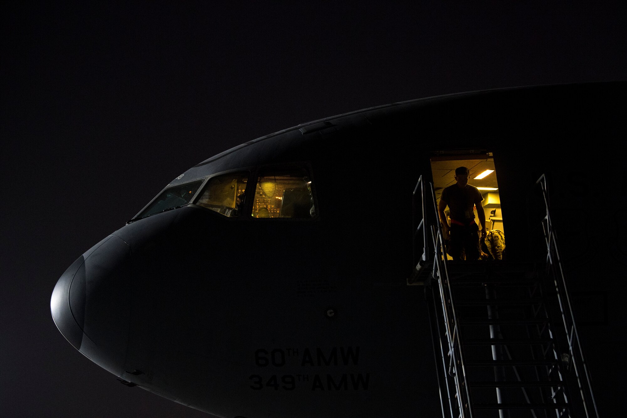 U.S. Air Force Airmen assigned to the 380th Expeditionary Wing conduct preflight inspections on a 908th Expeditionary Air Refueling Squadron (EARS) KC-10 Extender, at Al Dahfra Air Base, United Arab Emirates Dec. 17, 2019.