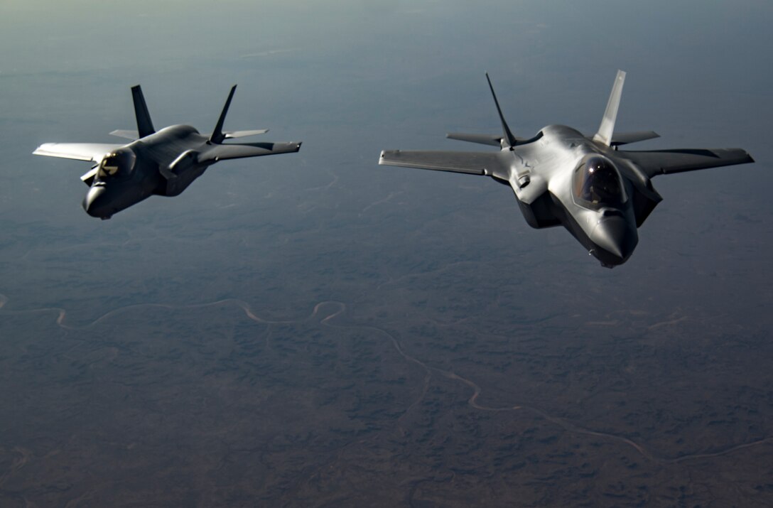 Two U.S. Air Force F-35A Lightning IIs assigned to the 34th Expeditionary Fighter Squadron from Al Dhafra Air Base, United Arab Emirates, flies in support of Operation Inherent Resolve Dec. 17, 2019.