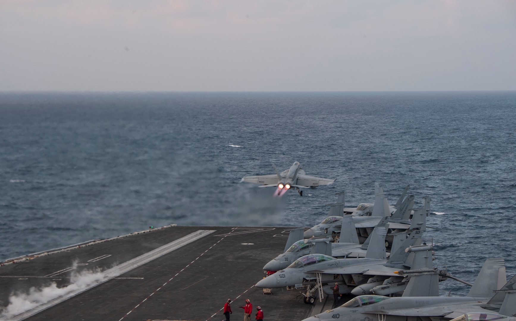 An F/A-18E Super Hornet, attached to the “Sunliners” of Strike Fighter Squadron (VFA) 81, takes off from the flight deck of the aircraft carrier USS Harry S. Truman (CVN 75) in the Arabian Sea, Dec. 20, 2019. The Harry S. Truman Carrier Strike Group is deployed to the U.S. 5th Fleet area of operations in support of naval operations to ensure maritime stability and security in the Central Region, connecting the Mediterranean and the Pacific through the western Indian Ocean and three strategic choke points. (U.S. Navy photo by Mass Communication Specialist 2nd Class Jake Carrillo)