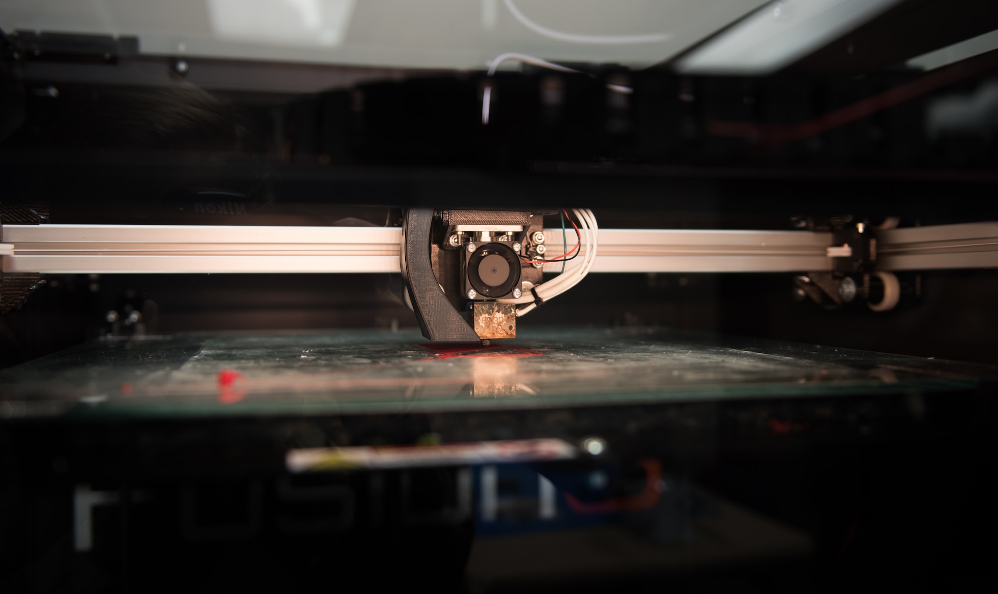 A 3D printer begins working at Joint Base Langley-Eustis, Virginia, Dec. 17, 2019. The printer is one of two in the new innovation lab at the 1st Fighter Wing. (U.S. Air Force photo by Airman 1st Class Sarah Dowe)