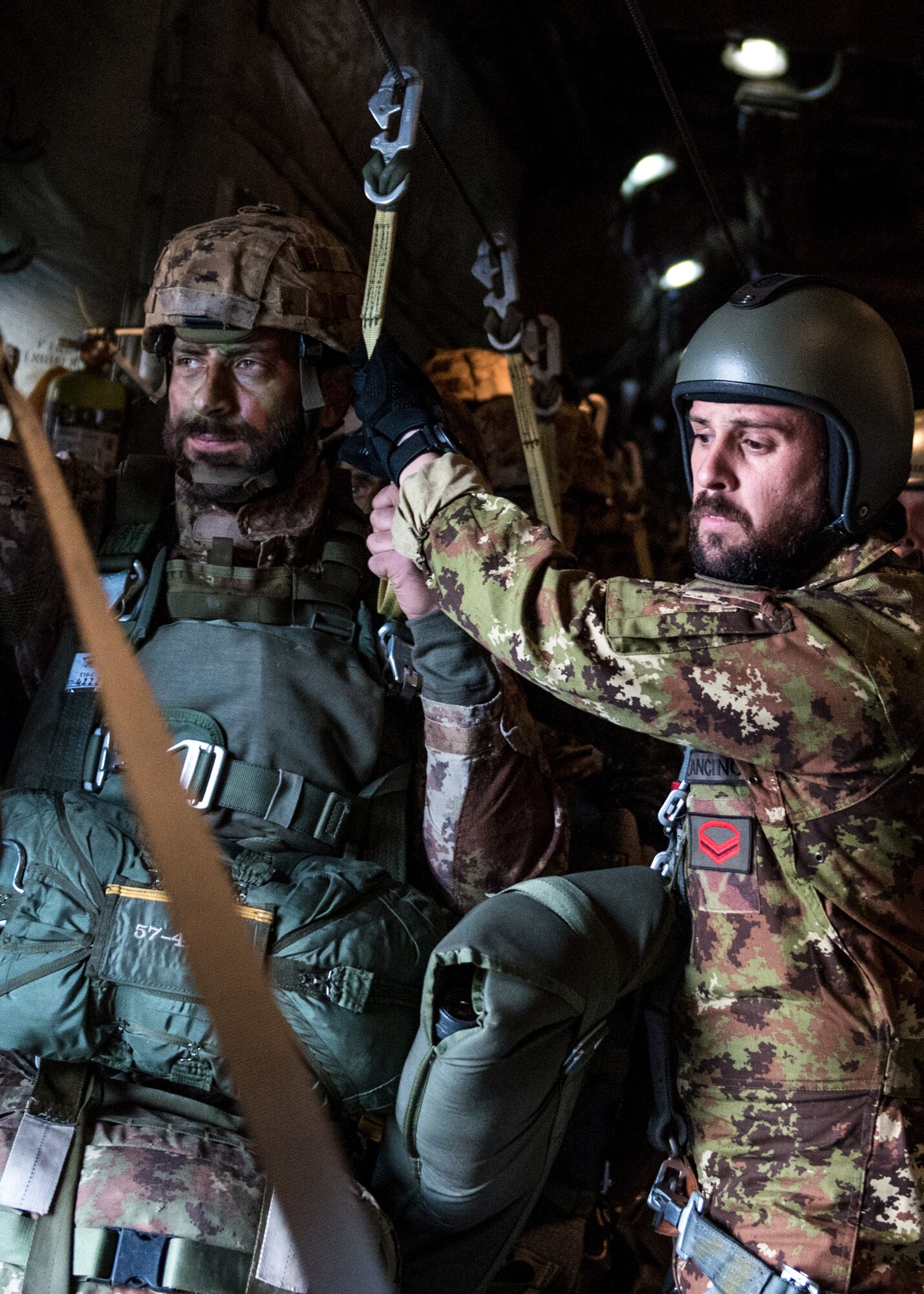 Members of the Italian Folgore, an airborne paratrooper brigade from the Italian Army, execute an airdrop mission alongside members of the Kentucky Air National Guard’s 123rd Airlift Wing in Pisa, Italy, Nov. 7, 2019. The mission was part of Mangusta 19, a bi-lateral exercise designed to promote readiness and interoperability among NATO allies. (U.S. Air National Guard photo by Senior Airman Chloe Ochs)