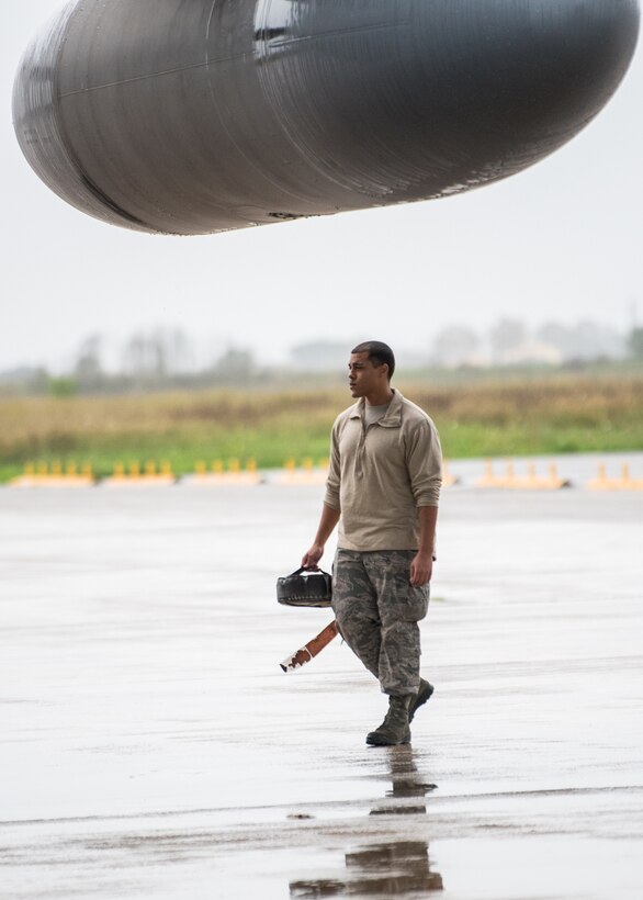 Senior Airman Josiah Hatcher, a crew chief from the Kentucky Air National Guard’s 123rd Maintenance Group, prepares a C-130 Hercules aircraft for flight formation training in Pisa, Italy, Nov. 3, 2019. The sortie was part of Mangusta 19, a bi-lateral exercise with the Italian Army designed to promote readiness and interoperability among NATO allies. (U.S. Air National Guard photo by Senior Airman Chloe Ochs)