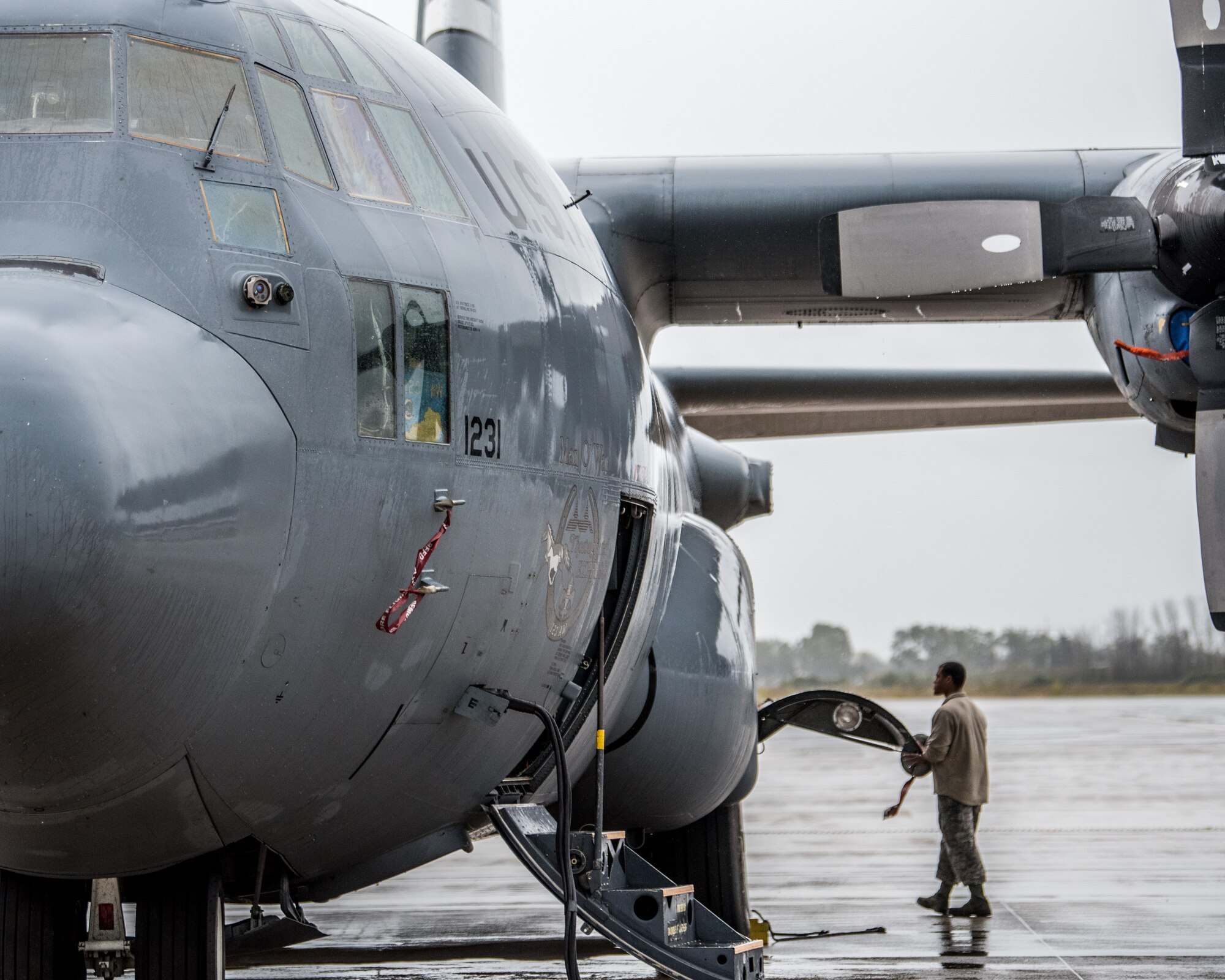 Senior Airman Josiah Hatcher, a crew chief with the Kentucky Air National Guard’s 123rd Maintenance Group, prepares a C-130 Hercules aircraft for flight formation training in Pisa, Italy, Nov. 3, 2019. The sortie was part of Mangusta 19, a bi-lateral exercise with the Italian Army designed to promote readiness and interoperability among NATO allies. (U.S. Air National Guard photo by Senior Airman Chloe Ochs)