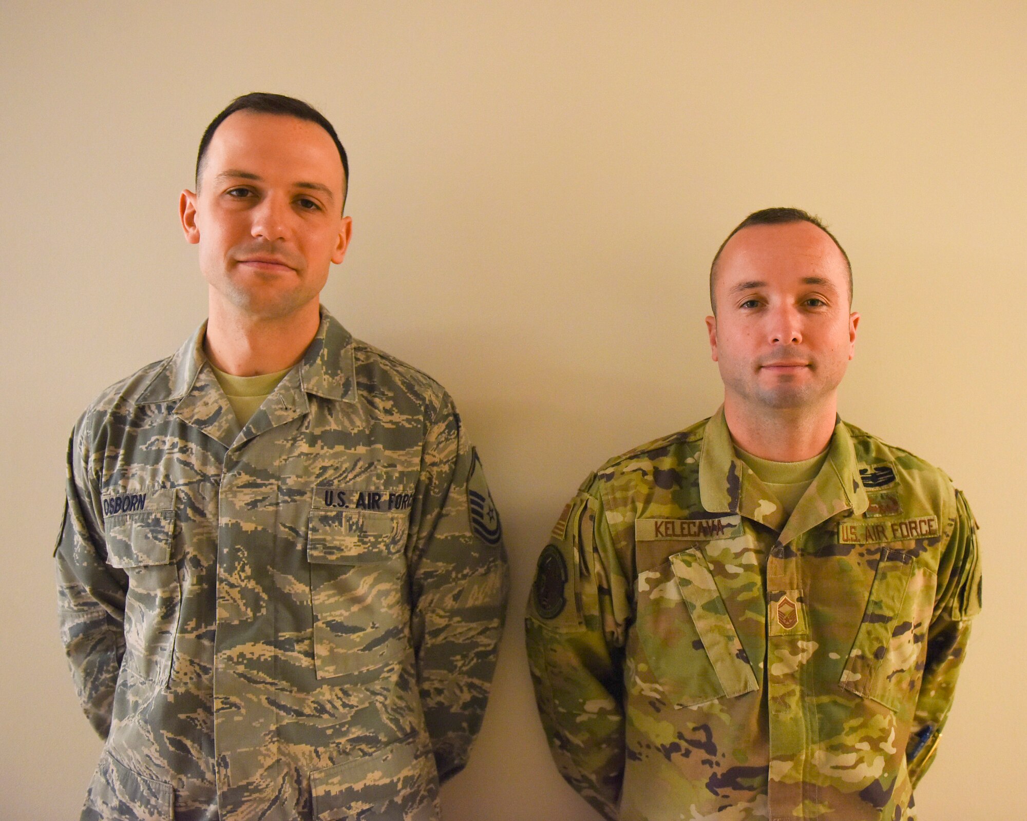 Senior Master Sgt. Jacob Kelecava, 911th Security Forces operations superintendent, and Master Sgt. Joshua Osborne, 911th Aeromedical Staging Squadron unit fitness program manager, pose for a photo at the Pittsburgh International Airport Air Reserve Station, Pennsylvania, Dec. 8, 2019.
