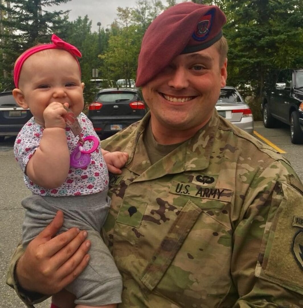 U.S. Army Spc. William McCormick and daughter Lillian.