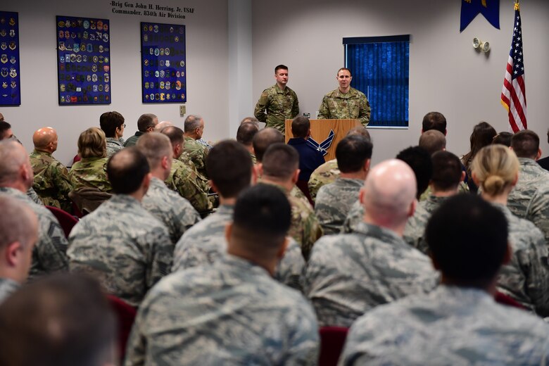 Maj. Philip Hahn, commander of the 911th Communications Squadron, speaks at his assumption of command ceremony at the Pittsburgh International Airport Air Reserve Station, Pa., Dec. 7, 2019.