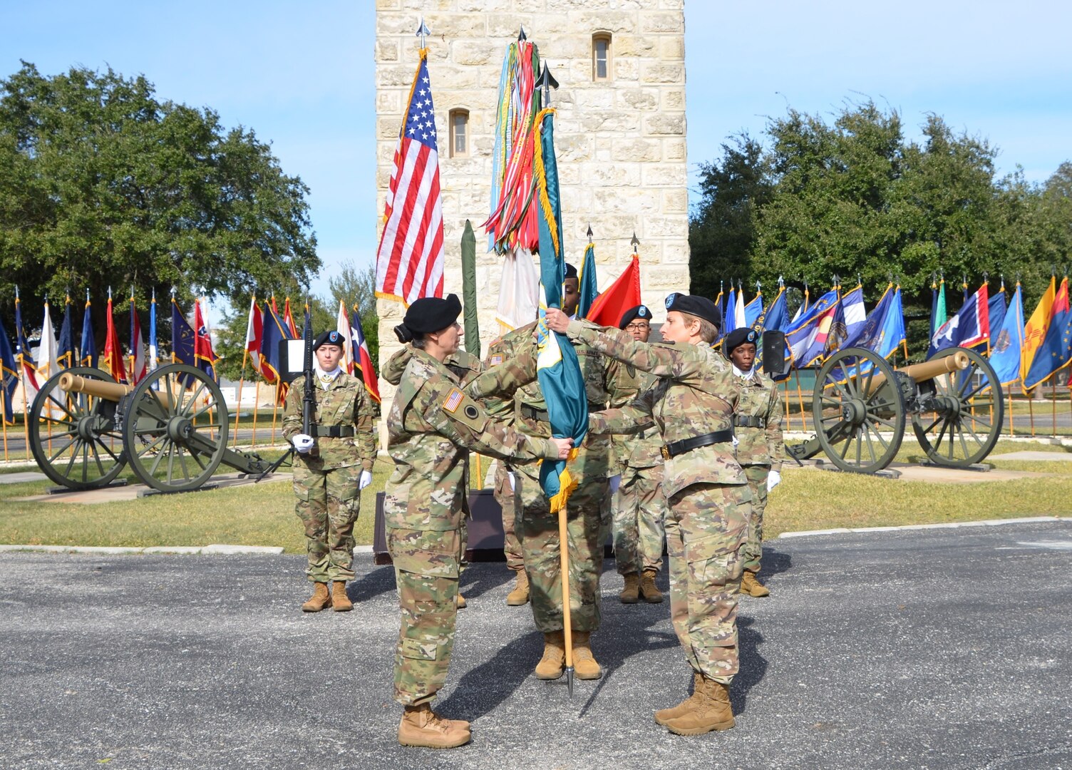 Command Sgt. Maj. Chantel Sena-Diaz, left, accepts the Mission and Installation Contracting Command colors from Brig. Gen. Christine Beeler during an assumption-of-responsibility ceremony Dec. 19 at Joint Base San Antonio-Fort Sam Houston. Beeler is the MICC commanding general. Sena-Diaz comes to the MICC from Fort Jackson, South Carolina, where she served as the commandant of the U.S. Army Soldier Support Institute Noncommissioned Officer Academy.