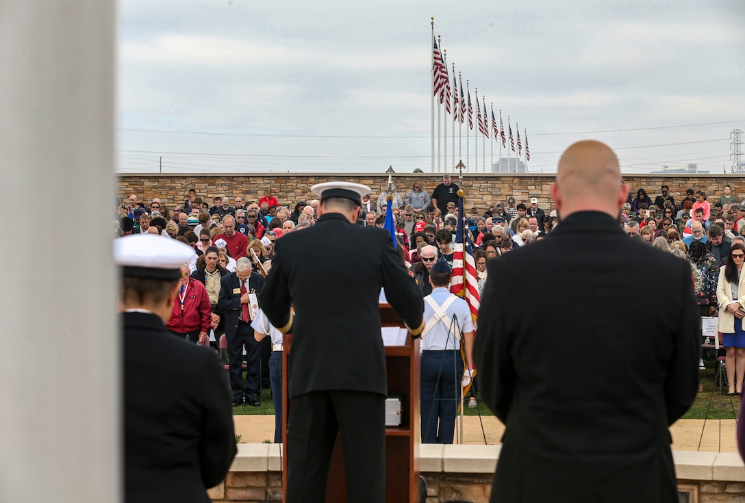 AJ Budenz, Gold Star family member, stands by his mother's side after laying a wreath on behalf of all the Gold Star Families who lost their loved ones  in San Diego, Dec. 14, 2019. The surrounding San Diego community gathered for Miramar National Cemetery’s annual Wreaths Across America ceremony to give their support to friends and family who have  lost loved ones.