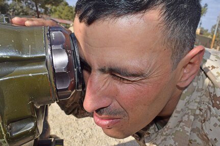 A Jordan Armed Forces-Arab Army soldier looks through the scope of a BGM-71 Tube-launched, Optically tracked, Wireless-guided weapon system during a Subject Matter Expert Exchange with U.S. Army Soldiers of Charlie Company, 1st Combined Arms Battalion, 252 Armor Regiment, 30th Armored Brigade Combat Team, “Old Hickory,” North Carolina Army National Guard, coordinated by Military Engagement Team-Jordan,158th Maneuver Enhancement Brigade, Arizona Army National Guard, outside Amman, Jordan, in December 2019.