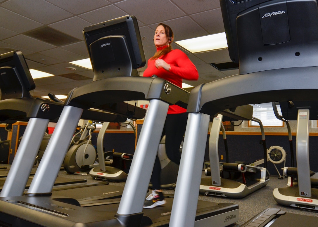Defense Logistics Agency employee Amber Smoker tries out one of the new treadmills during her workout in the MWR Fitness Center.