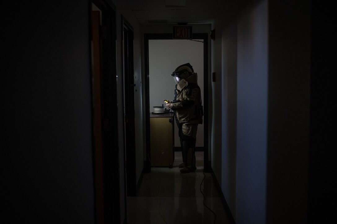 An explosive ordnance disposal specialist with Team Scott, 932nd Airlift Wing and 375th Air Mobility Wing, conducts improvised explosive device detection and defeat operations to showcase Scott Air Force Bases’ capabilities to the St. Louis Regional Bomb and Arson team during training in St. Louis, Oct. 22, 2019. Each team and had a chance to demonstrate their ability to respond to a simulated event. (U.S. Air Force photo by Christopher Parr)