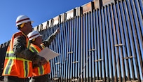 Lt. Gen. Todd Semonite, 54th Chief of Engineers and Commanding General, U.S. Army Corps of Engineers (right), and Col. Rafael “Pete” Pazos, U.S. Army Corps of Engineers South Pacific Border District commander (left), inspect completed panel sections at the Yuma 1 project site near Yuma, Arizona, Dec. 19, 2019. The USACE South Pacific Border District is providing contracting services, including design and construction oversight, of Department of Defense-funded Southwest border barrier projects in California, Arizona, New Mexico and Texas at the direction of the Administration and at the request of Department of Homeland Security, Customs and Border Protection.