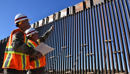 Lt. Gen. Todd Semonite, 54th Chief of Engineers and Commanding General, U.S. Army Corps of Engineers (right), and Col. Rafael “Pete” Pazos, U.S. Army Corps of Engineers South Pacific Border District commander (left), inspect completed panel sections at the Yuma 1 project site near Yuma, Arizona, Dec. 19, 2019. The USACE South Pacific Border District is providing contracting services, including design and construction oversight, of Department of Defense-funded Southwest border barrier projects in California, Arizona, New Mexico and Texas at the direction of the Administration and at the request of Department of Homeland Security, Customs and Border Protection.