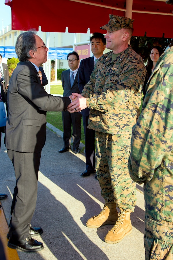 U. S. Marine Corps Brig. Gen. Christopher McPhillips, deputy commanding general of III Marine Expeditionary Force, welcomes Okinawa Governor, Denny Tamaki to Camp Kinser, Okinawa, Japan, Jan. 31, 2019. During the tour the governor and members of his staff were shown the current progress of the consolidation and relocation project to return Camp Kinser to the Government of Japan. (U.S. Marine Corps photo by Lance Cpl. Nicole Rogge)
